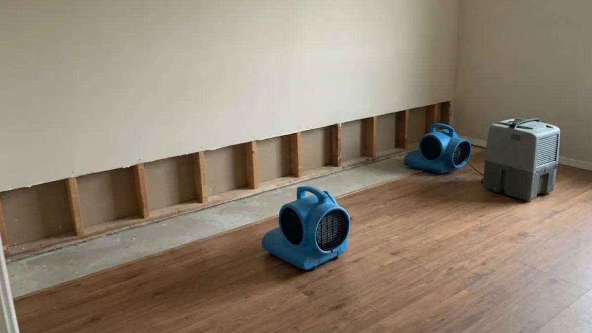 Drying equipment running in a room during water damage restoration in Mission Viejo