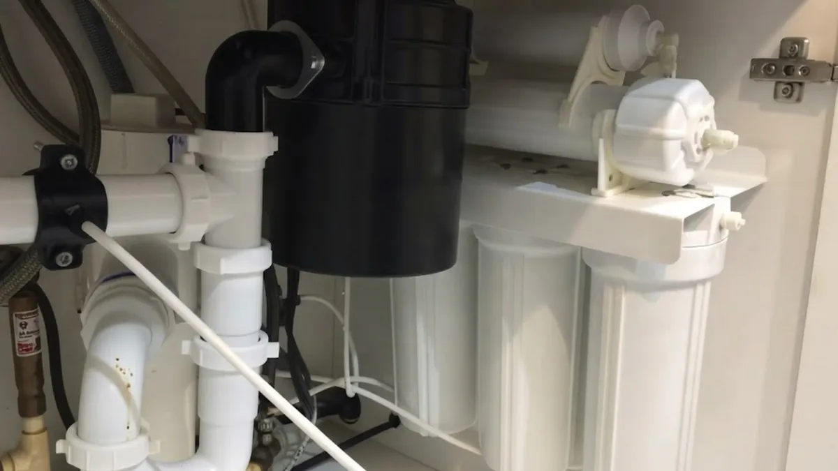 Under-sink reverse osmosis filtration system with storage tank in a Mission Viejo kitchen